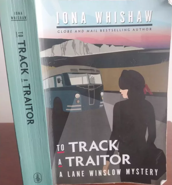 To Track a Traitor A Lane Winslow Mystery